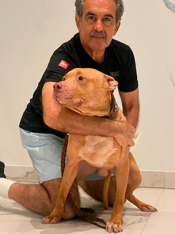 Victor Aycart and Red Nose Pitbull