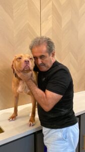 Victor Aycart and Red nose pitbull