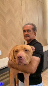 Victor Aycart and Athos from Bucha , Red nose dog